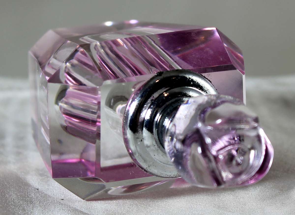 Mini pink glass perfume bottle