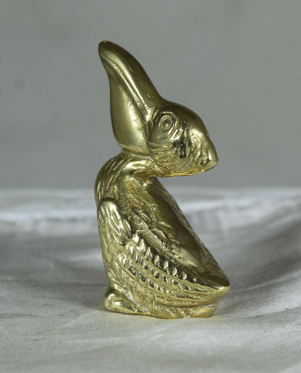 Miniature brass pelican
