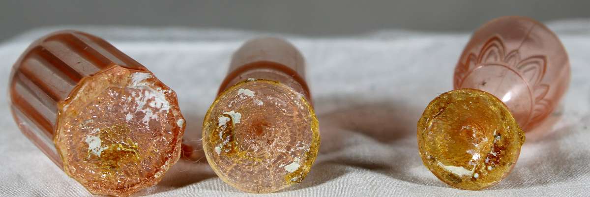 Trio of plastic glasses and mug