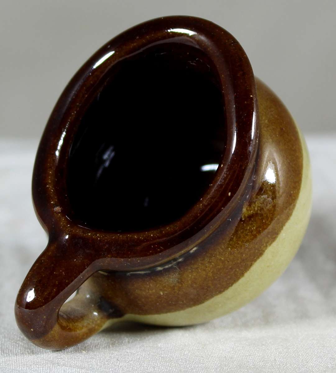 Miniature pottery milk jug