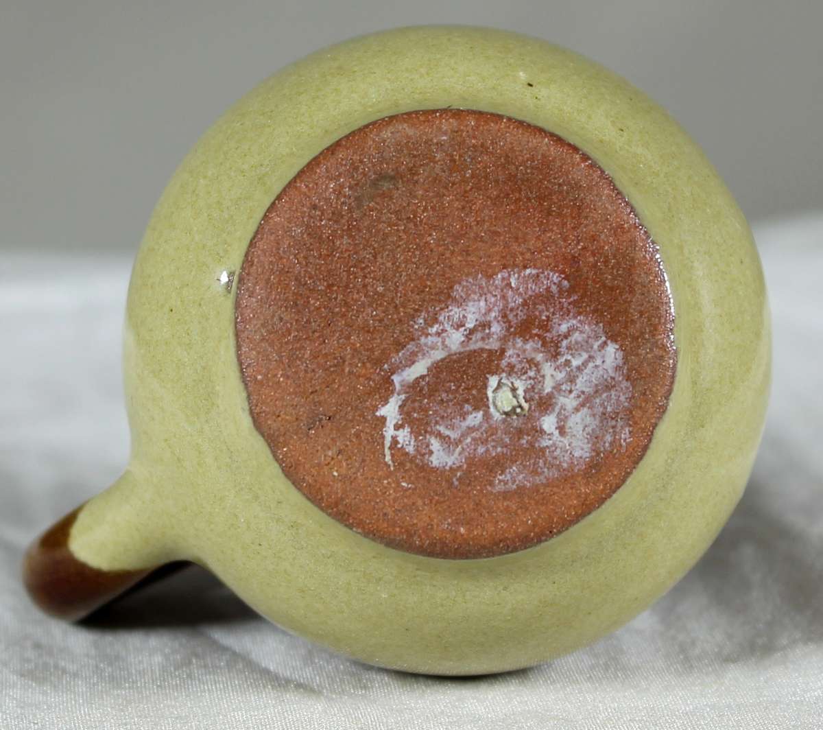 Miniature pottery milk jug