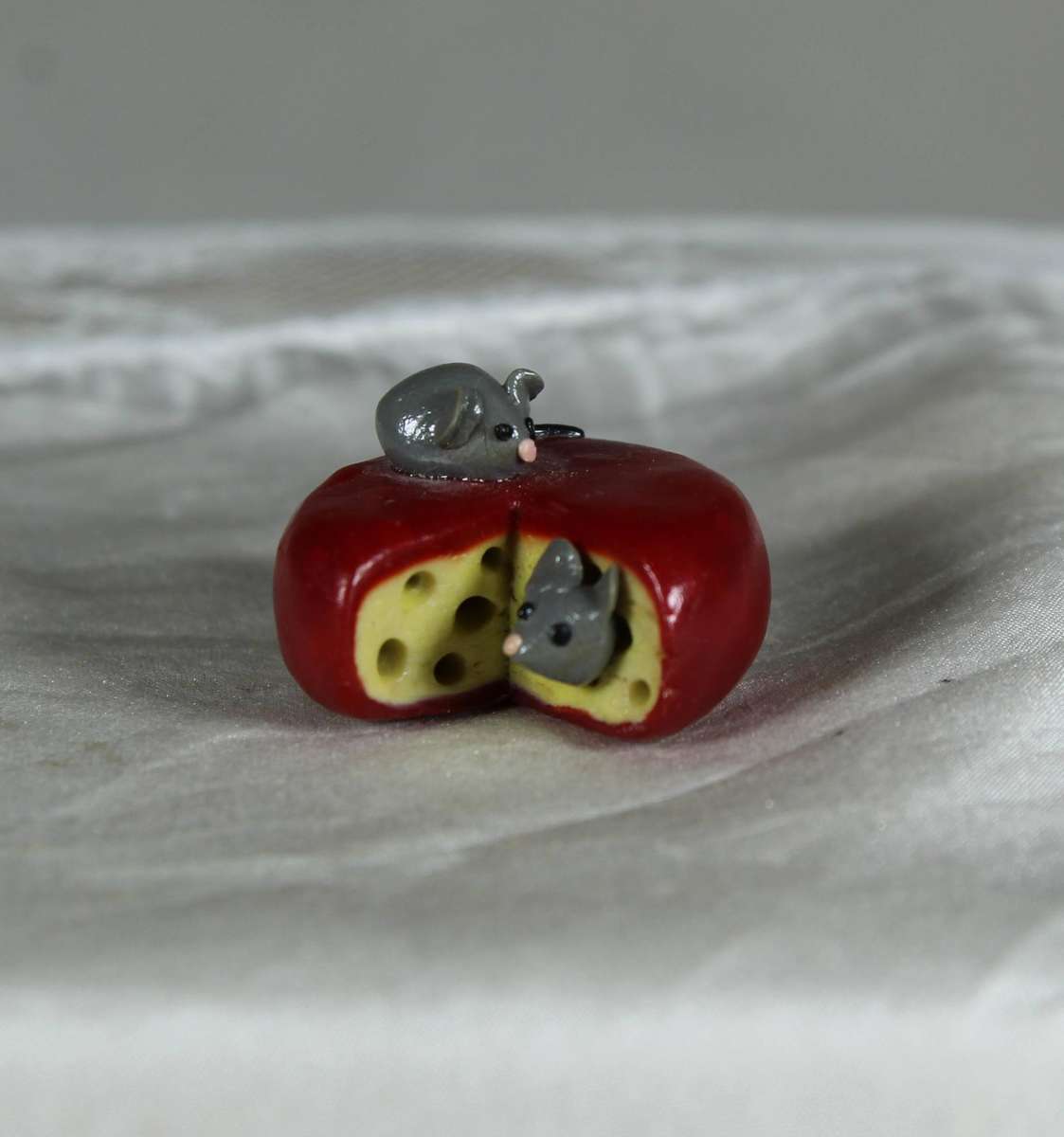 Mini miniature mice in a roll of cheese