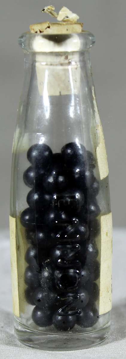 Mini medicine bottle - Lennon Obstruct pille