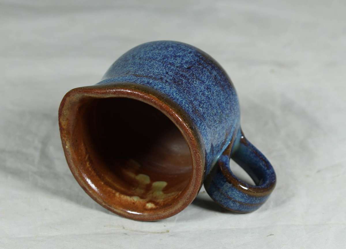 Small pottery milk jug