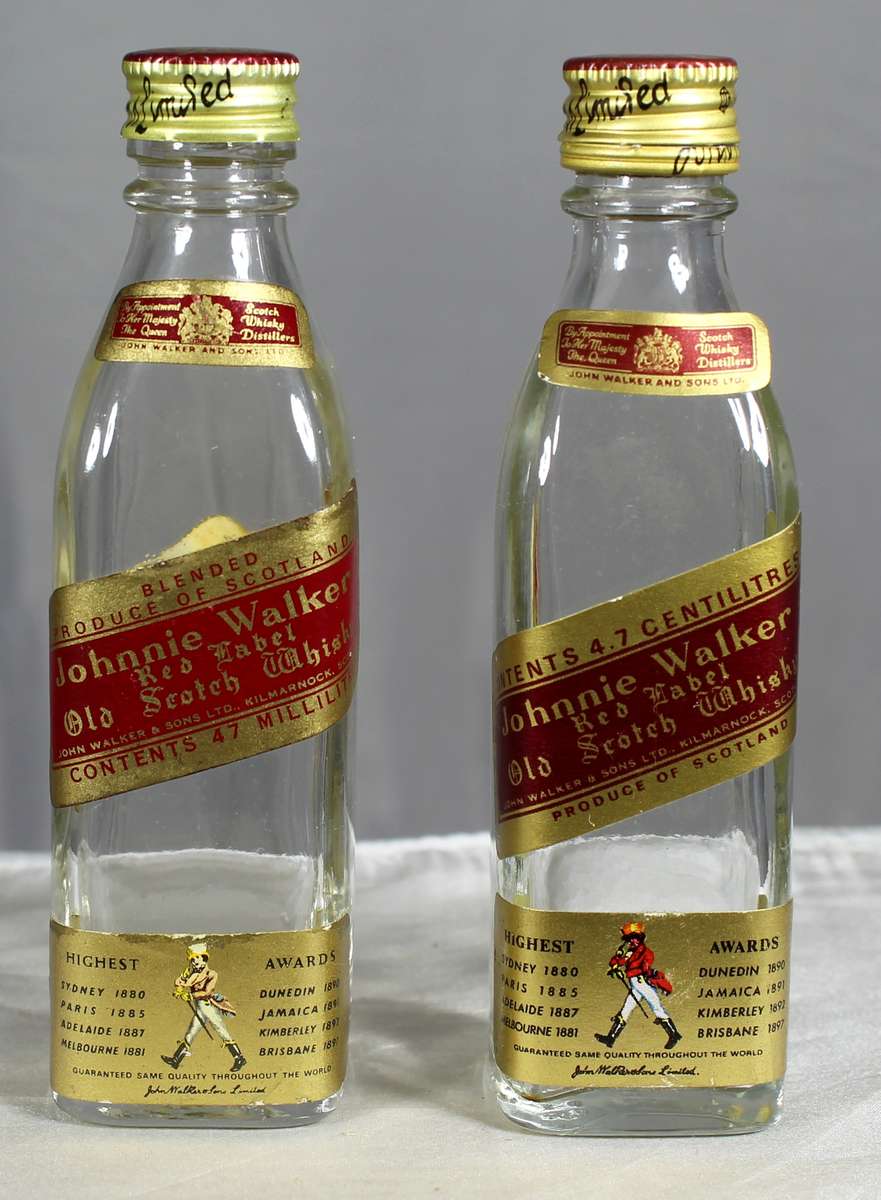 Empty liquor bottles - Pair of Johnnie Walker red