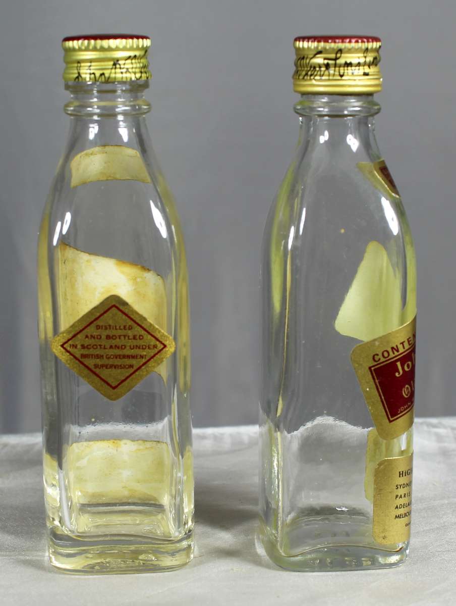 Empty liquor bottles - Pair of Johnnie Walker red