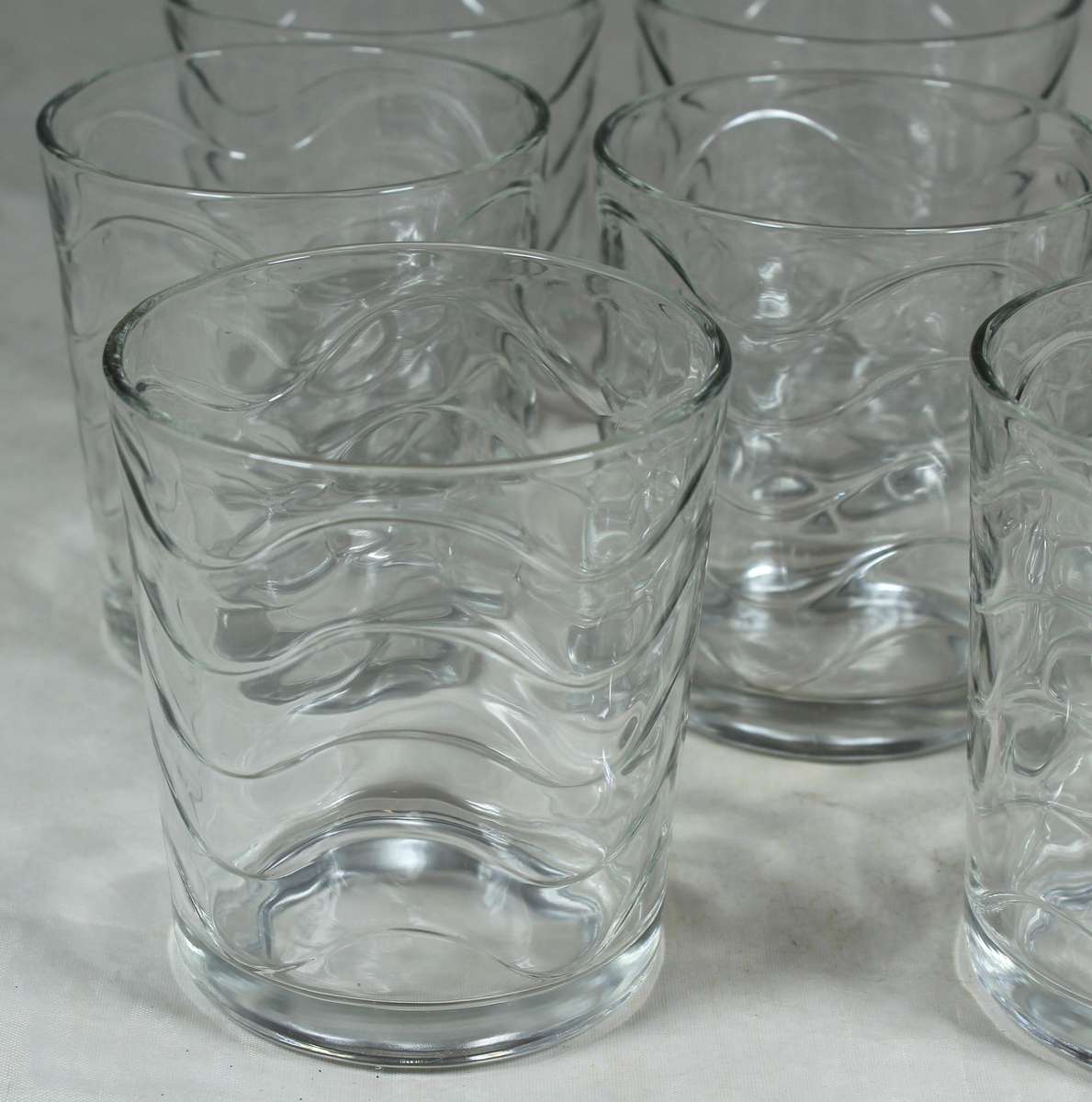 Set of 11 glasses with wave pattern
