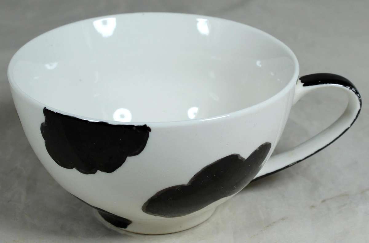 Large porcelain cow themed cup