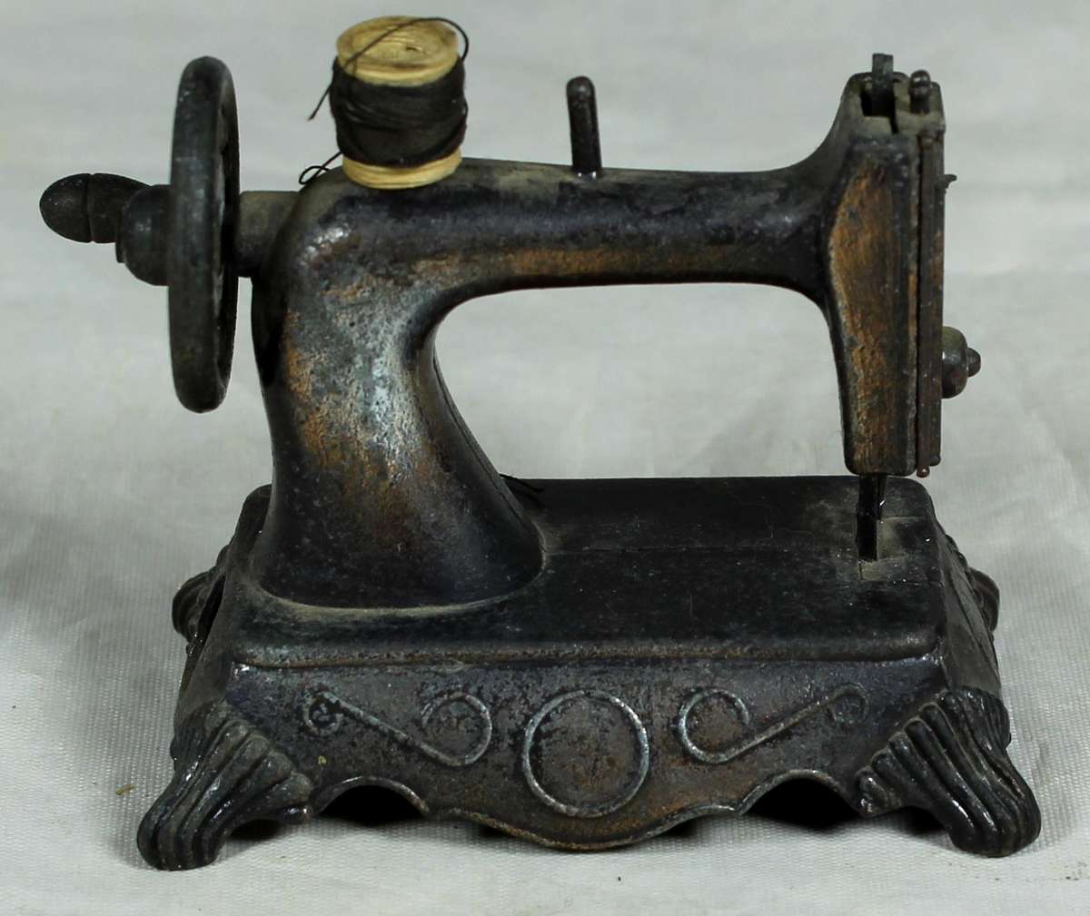 Miniature brass pencil sharpener - Sewing machine with bobbin
