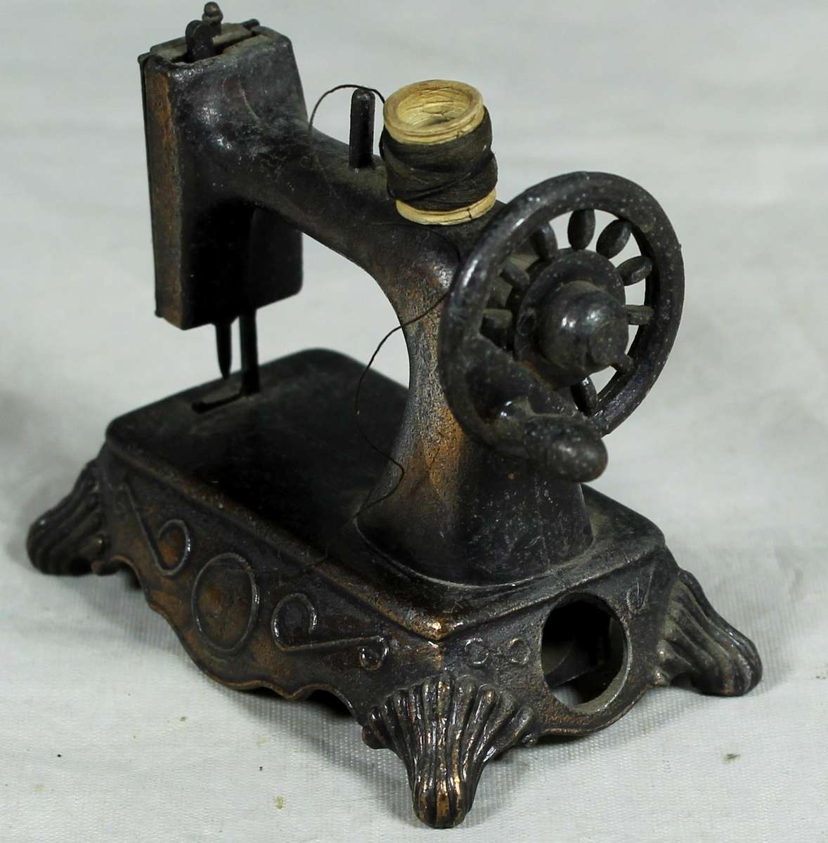 Miniature brass pencil sharpener - Sewing machine with bobbin