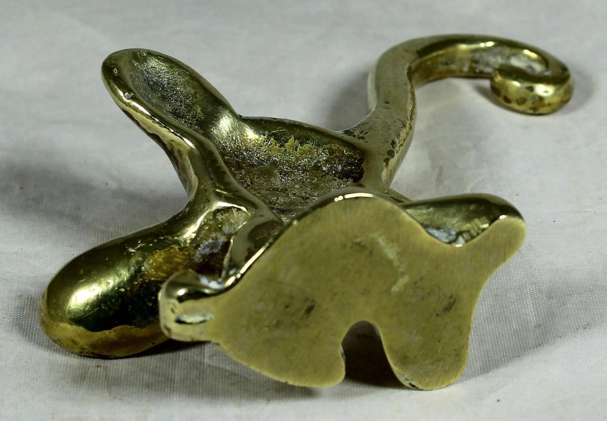 Brass elephant with long trunk