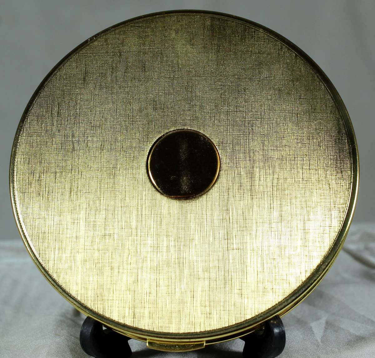 New golden powder compact