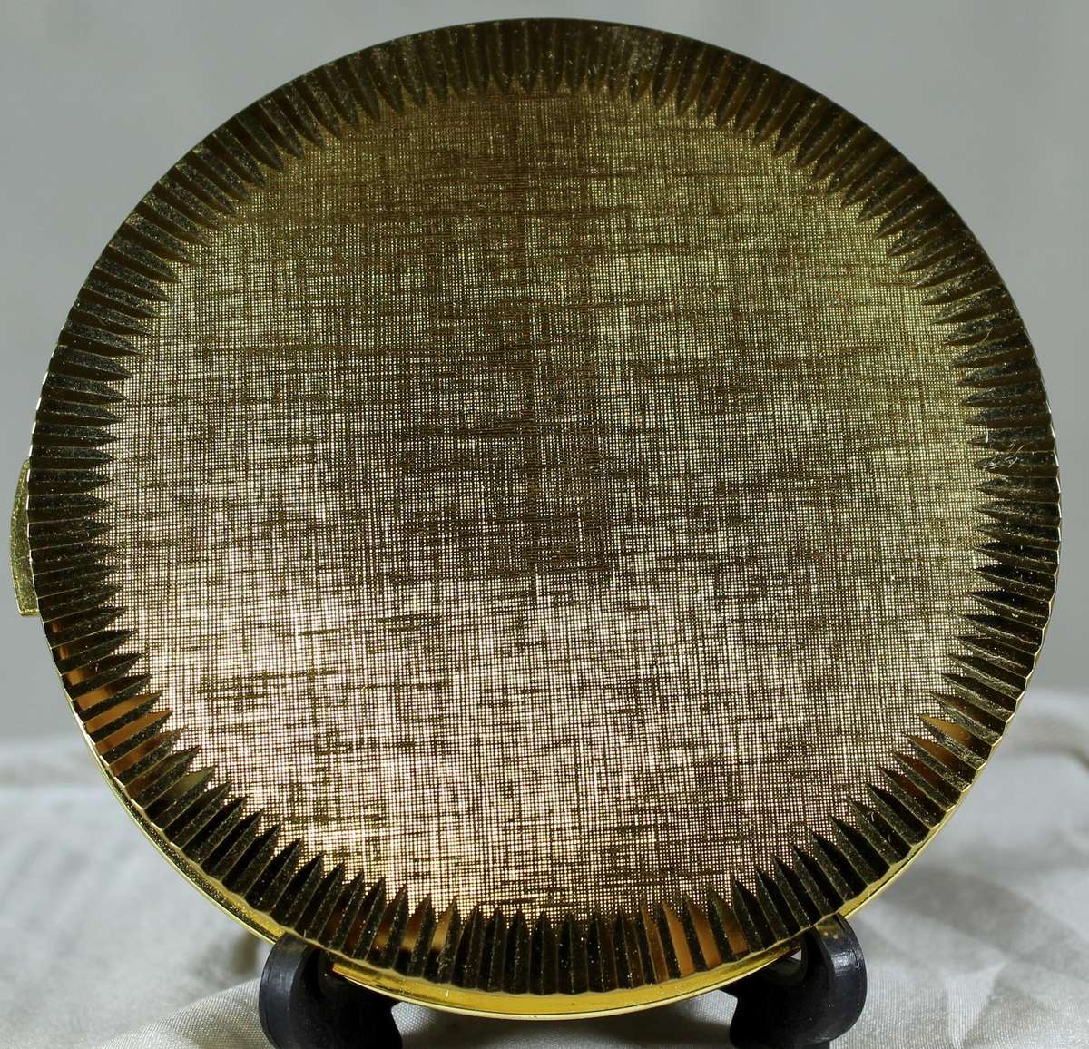 New golden powder compact