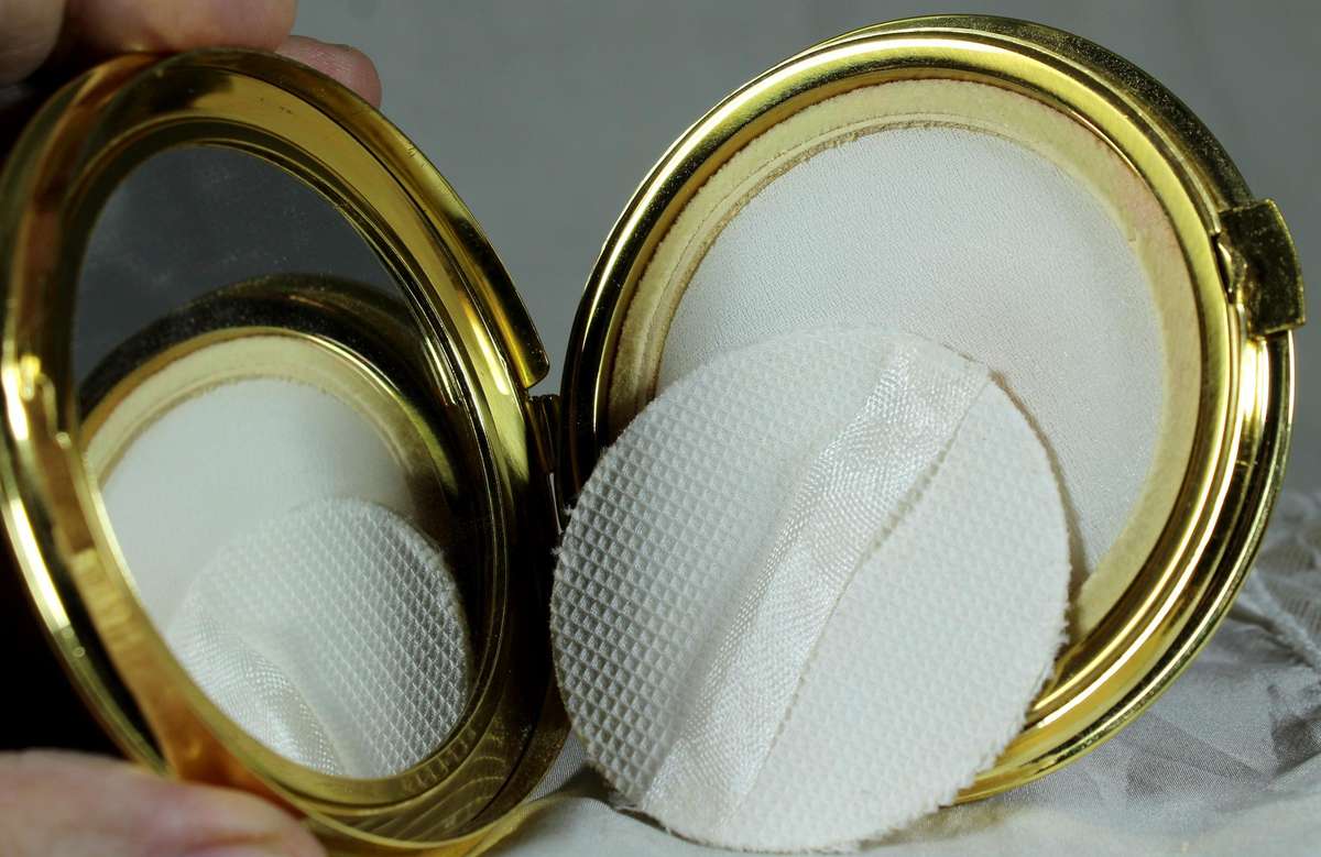 New golden powder compact
