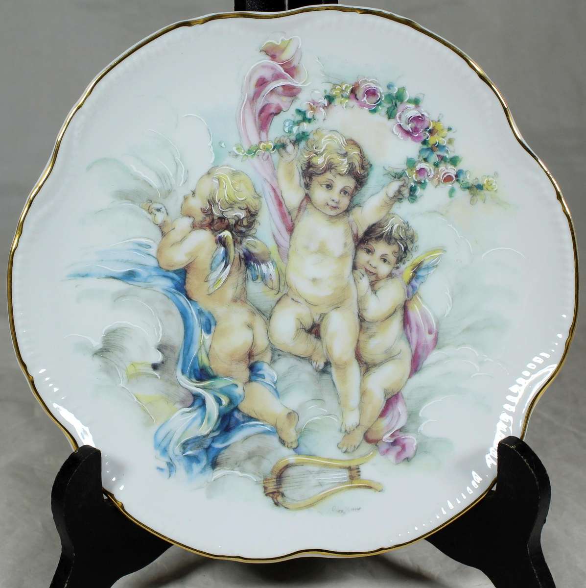 Jones & Middleton, Burslem - three cherubs playing in the clouds