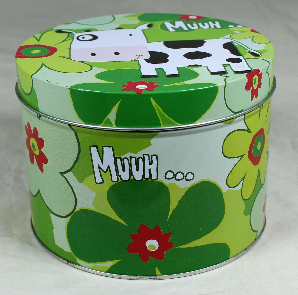 Cow themed tin