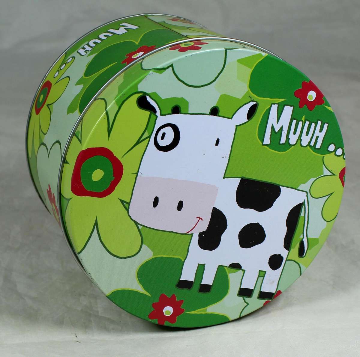 Cow themed tin