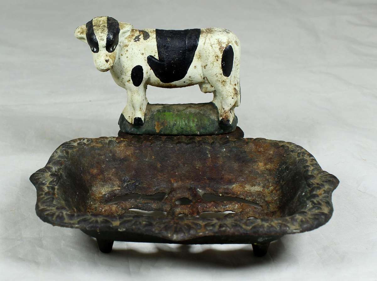 Cast metal cow soap dish