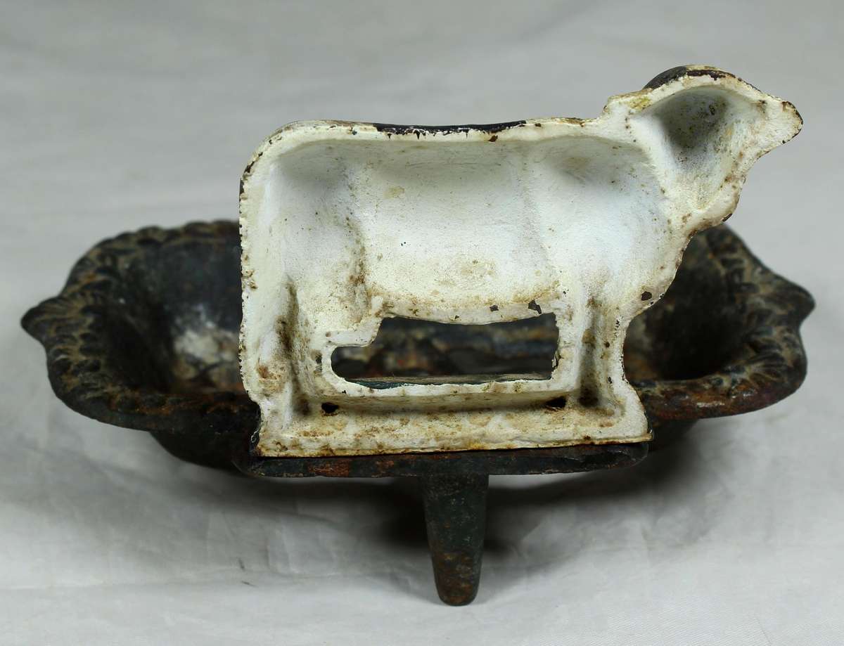 Cast metal cow soap dish