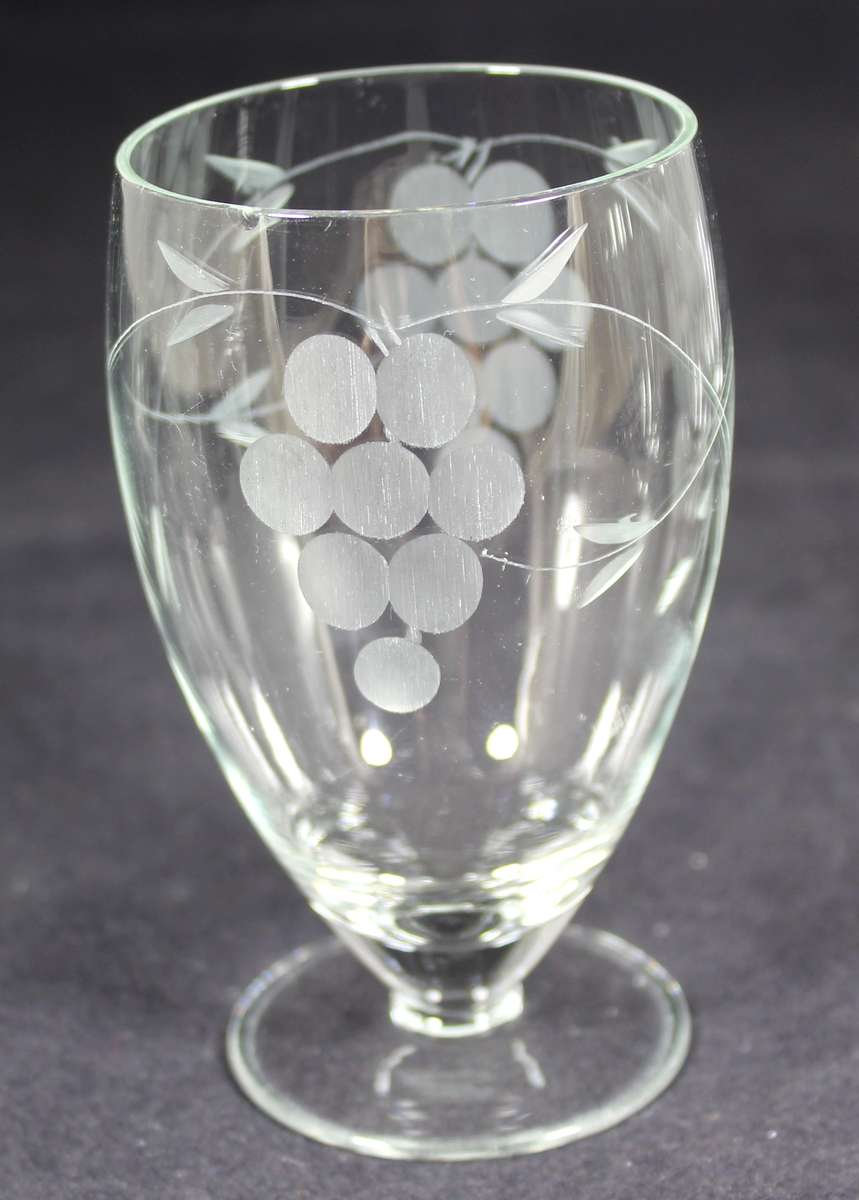 Set of six drinking glasses with etched grapes motif