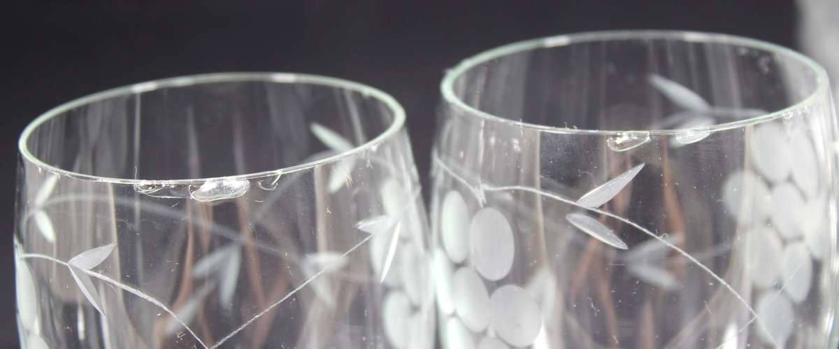 Set of six drinking glasses with etched grapes motif