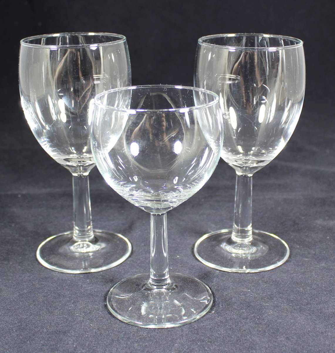 Pair of wine glasses plus a smaller one