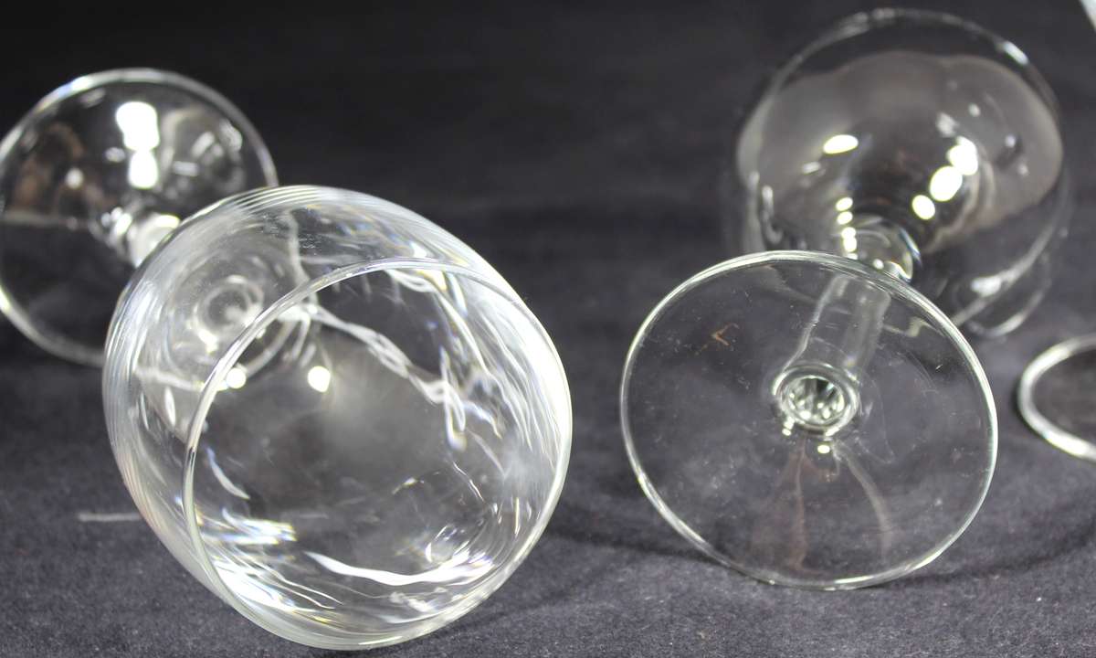 Pair of wine glasses plus a smaller one