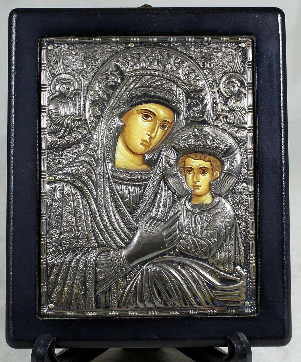 Religious metal icon on a stand