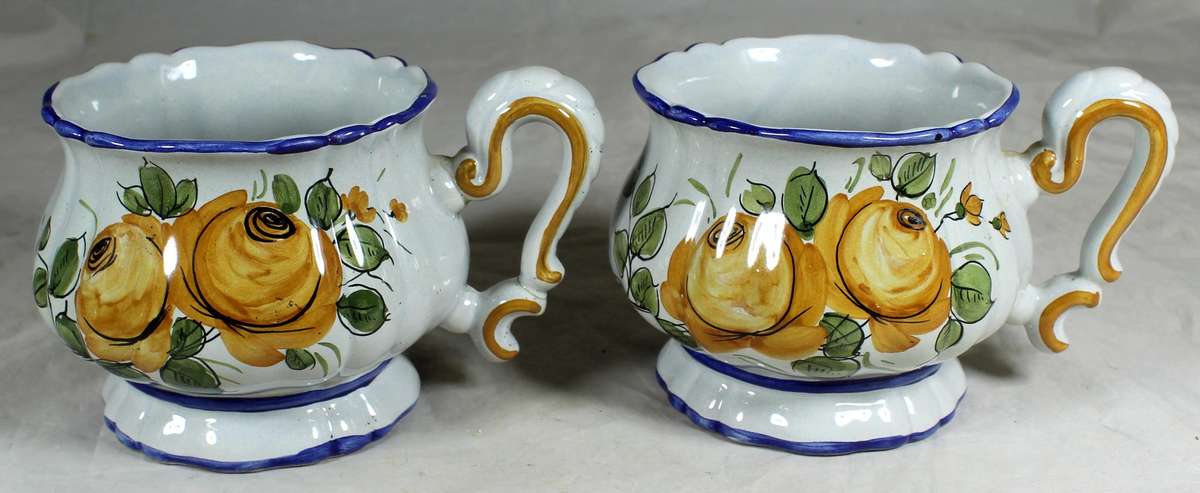 Pair of Italian candle holders