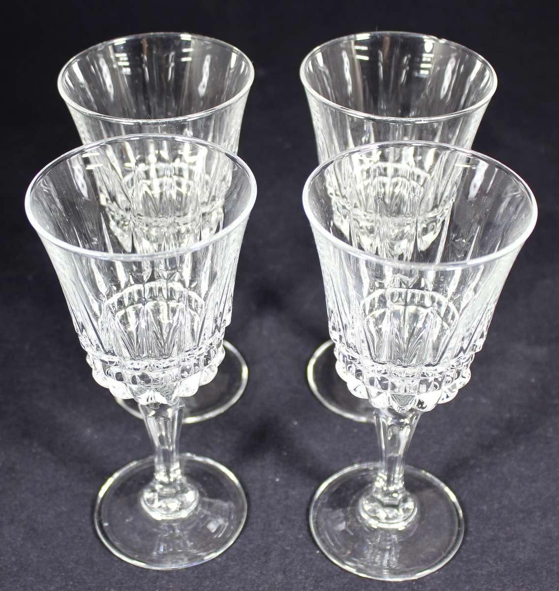 Set of four molded glasses