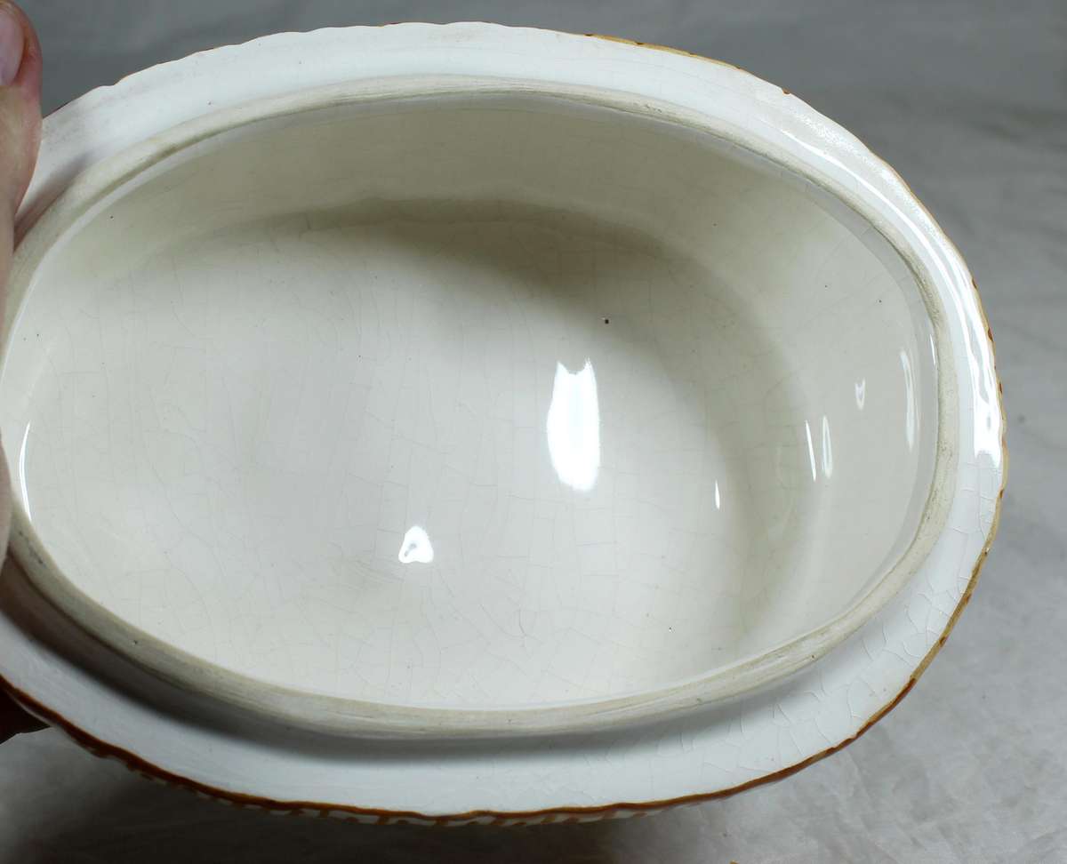 Bowl with multi colored chicken shaped lid