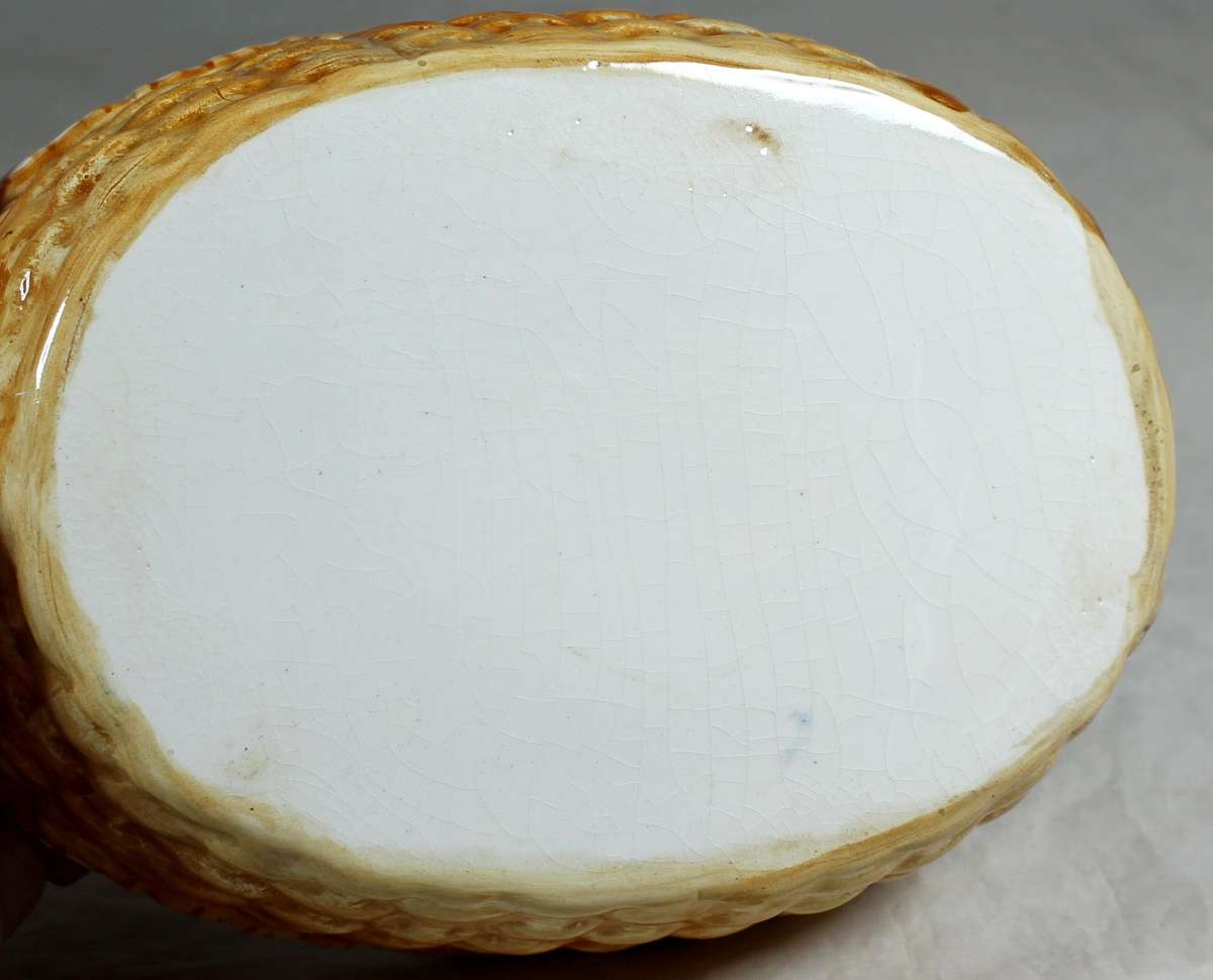 Bowl with multi colored chicken shaped lid