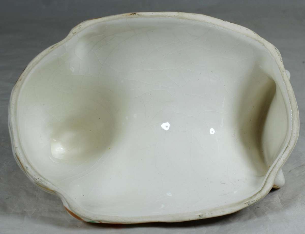 Bowl with multi colored chicken shaped lid