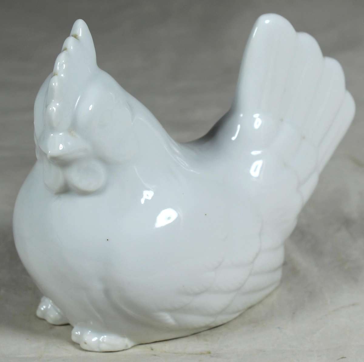 Small white porcelain chicken
