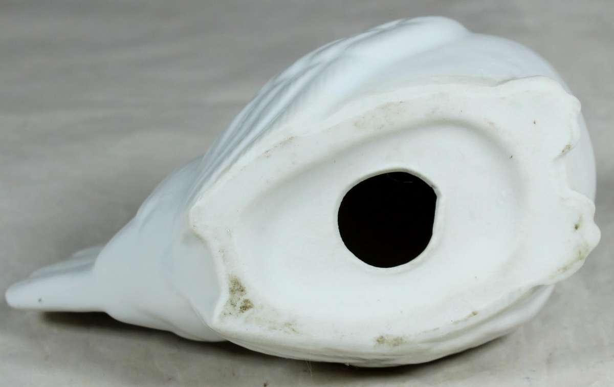 Small white porcelain chicken