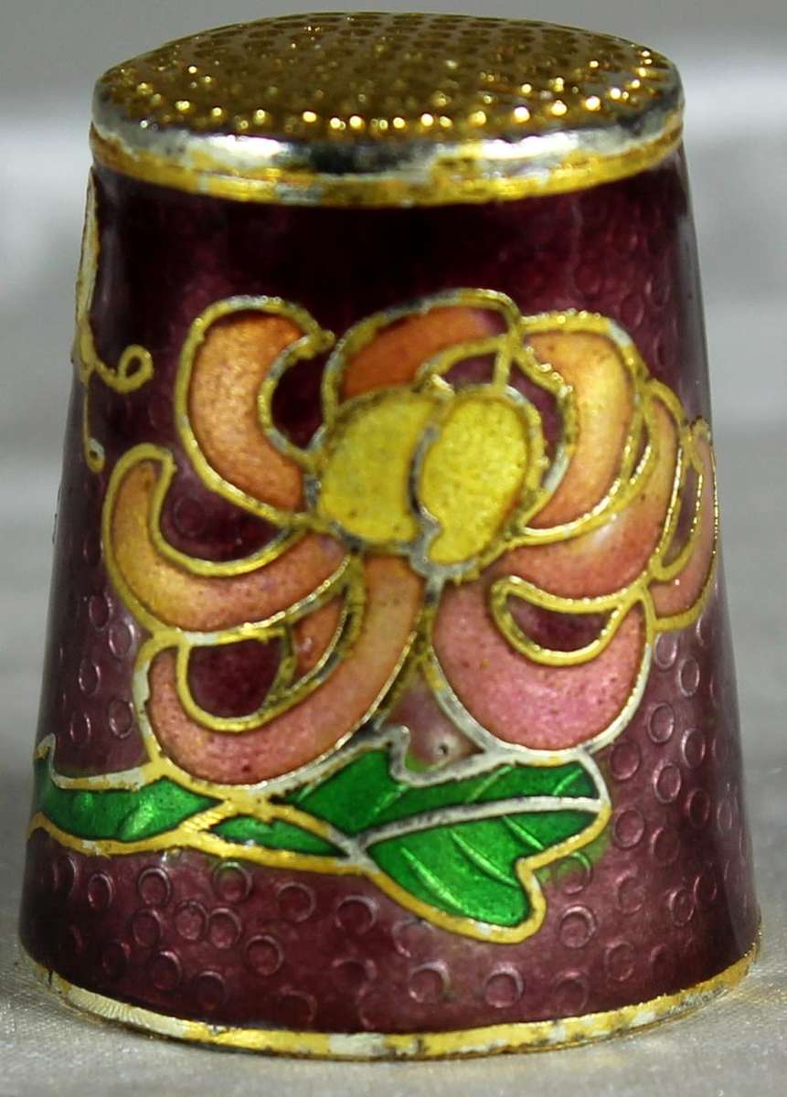 Cloissone thimble - orange flowers on a brown base