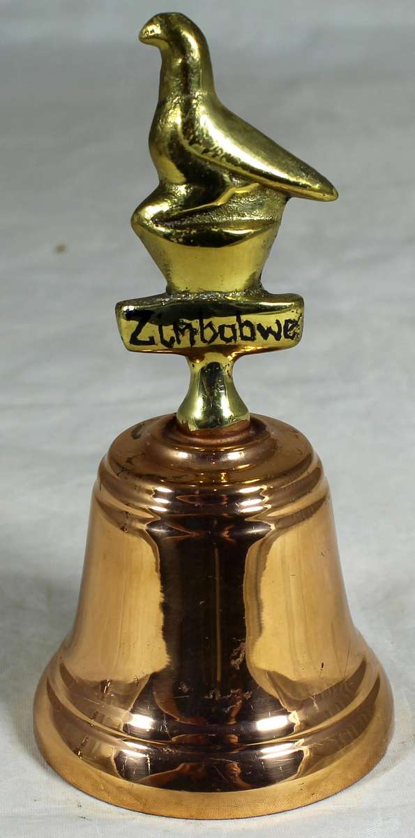 Souvenir copper bell with Zimbabwe bateleur eagle