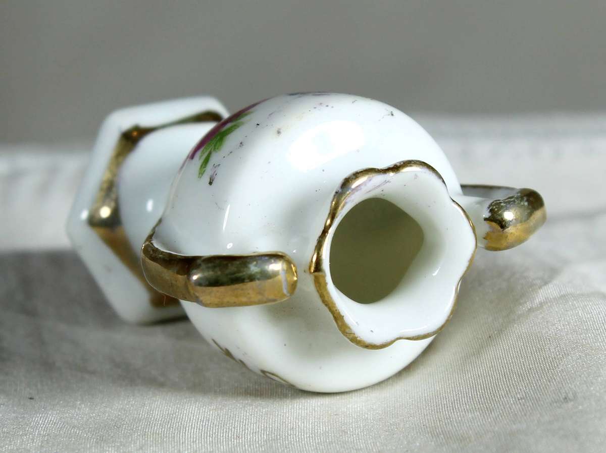 Miniature 2 handled porcelain vase in white