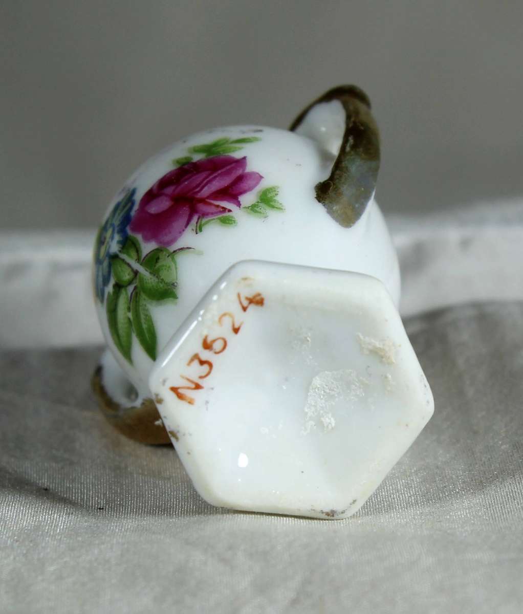Miniature 2 handled porcelain vase in white