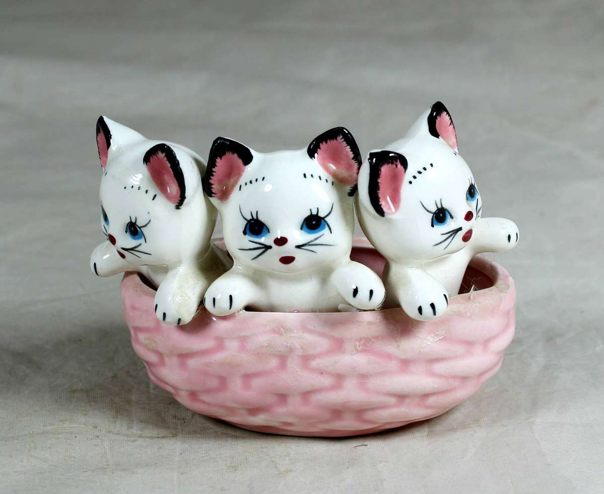Vintage porcelain kittens in a basket