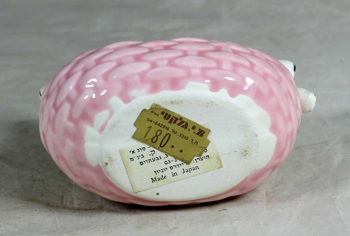 Vintage porcelain kittens in a basket