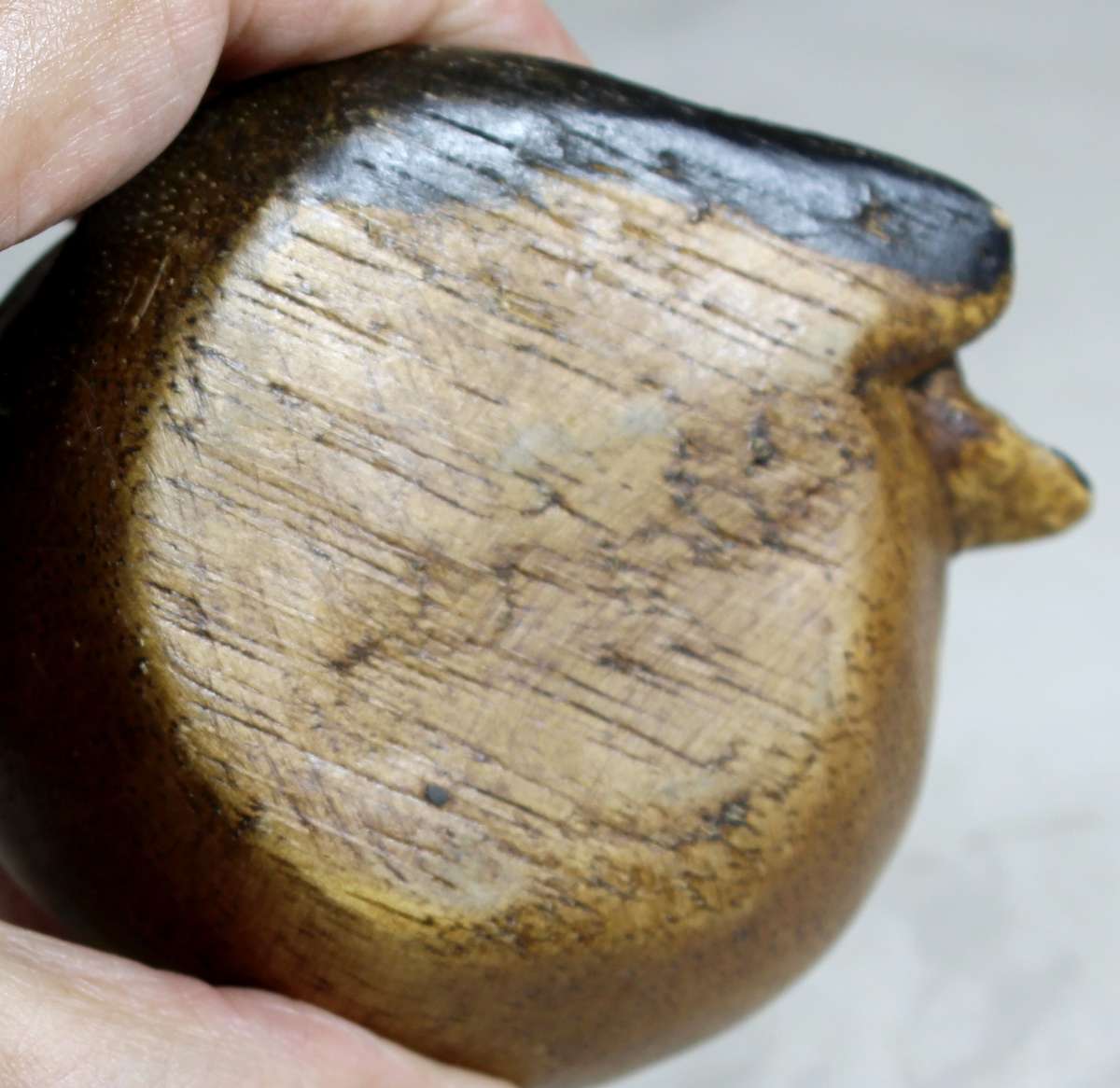 Carved wooden cat sleeping