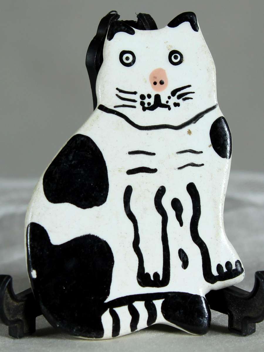 Black & white cat fridge magnet