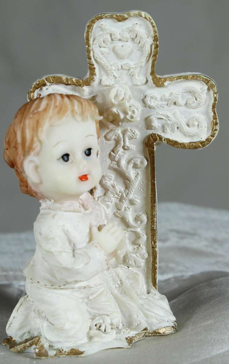 Small angel with cross