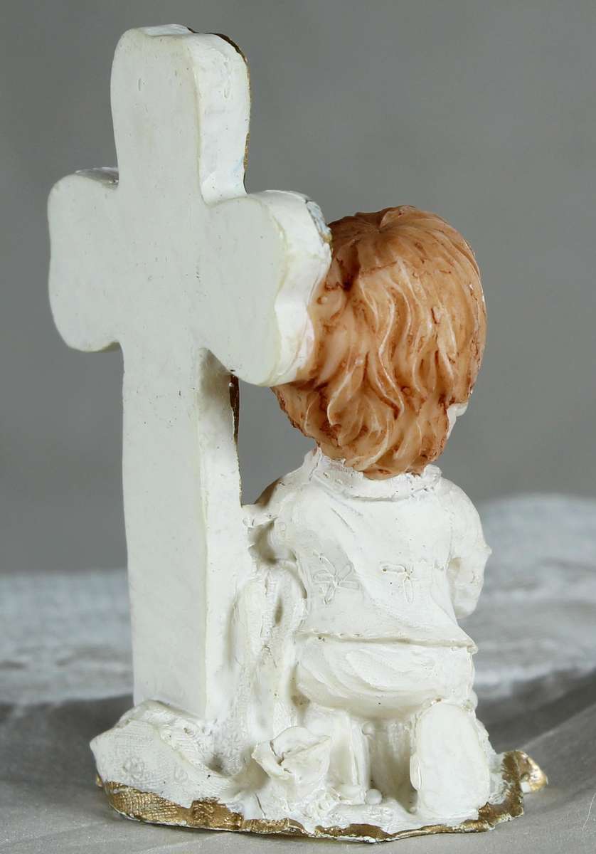 Small angel with cross