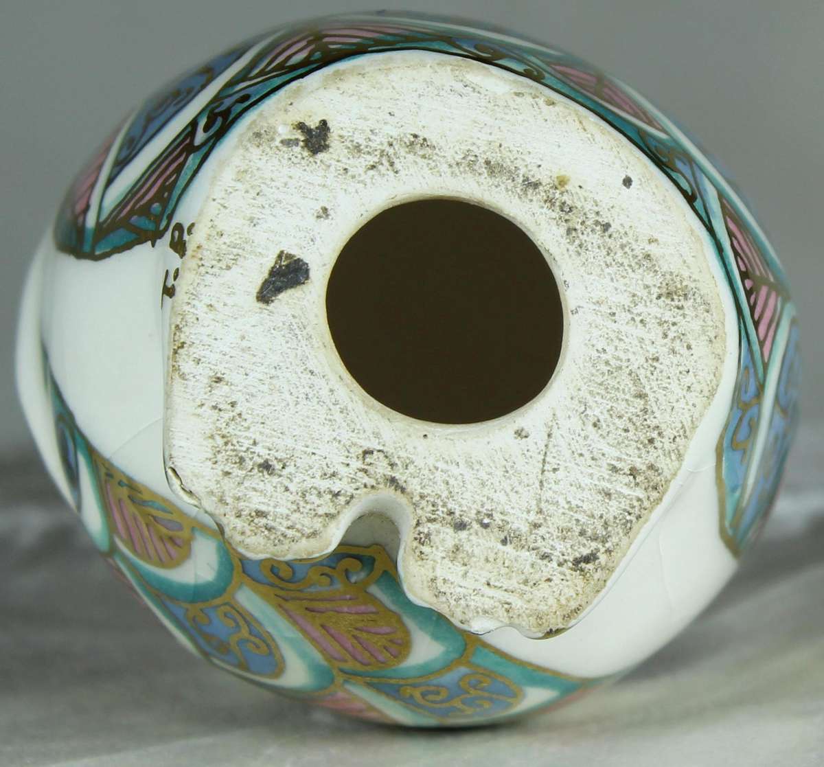 Glazed owl with orange eyes