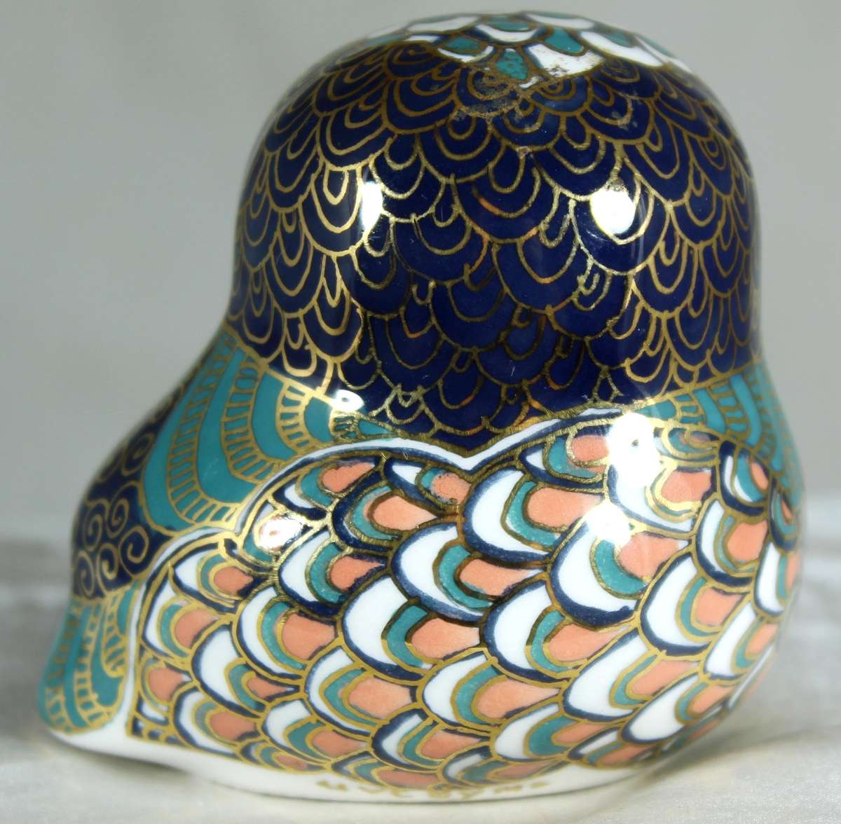 Glazed owl with starry eyes