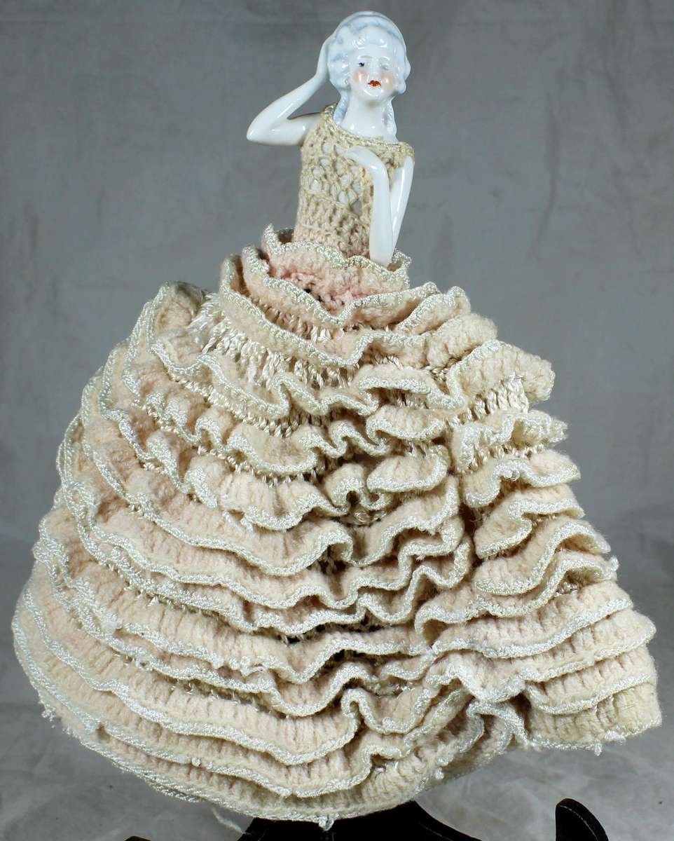 Half doll with pink dress
