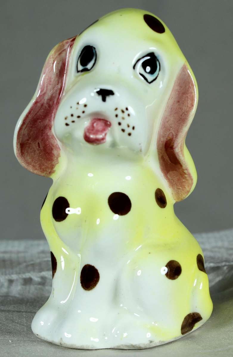 Small puppy, yellow with spots