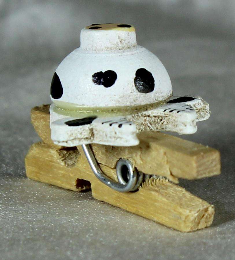 Miniature peg with character